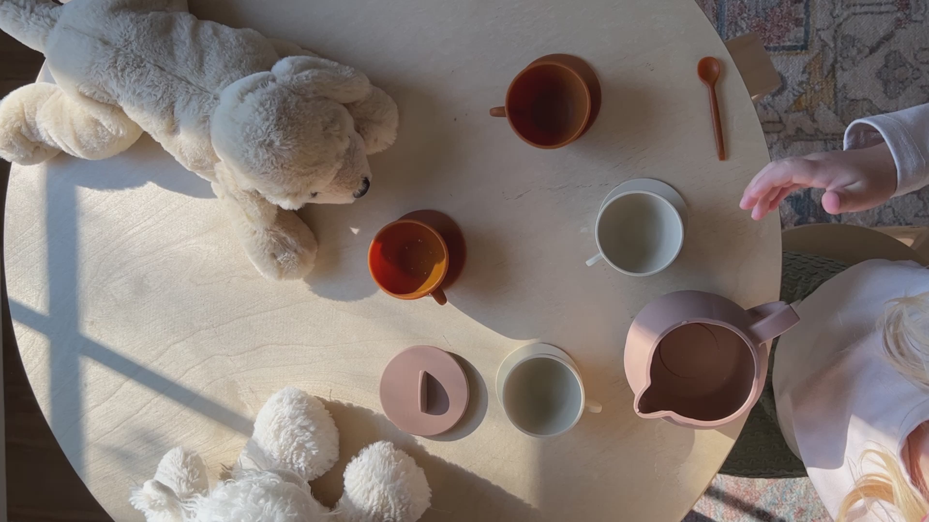 Load video: kids playing with tea set