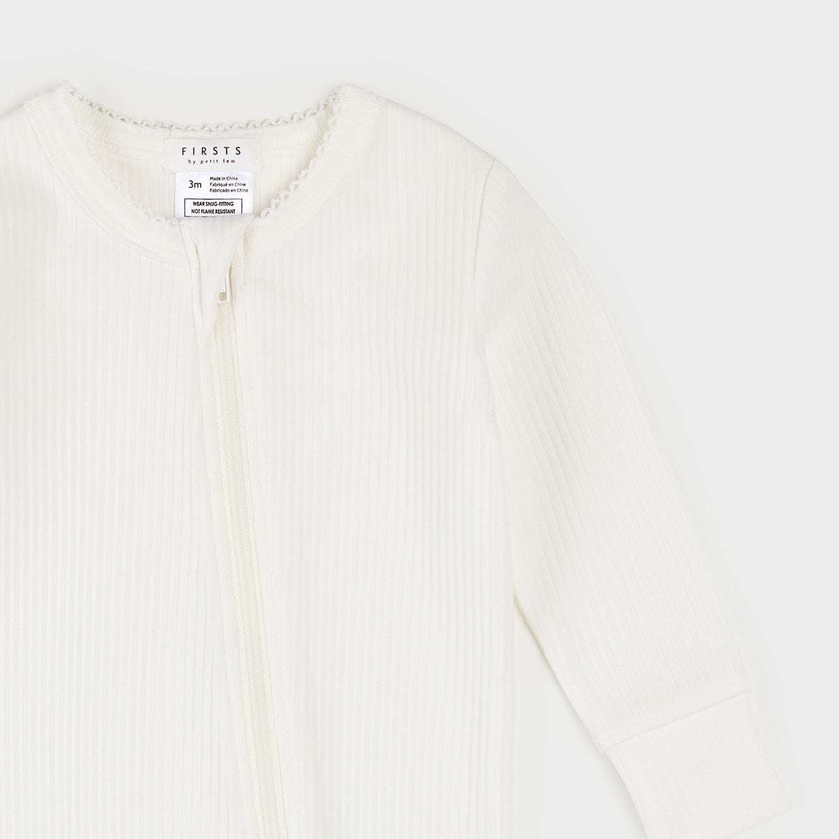 Ivory Modal Rib Frilled Sleeper cropped flat lay