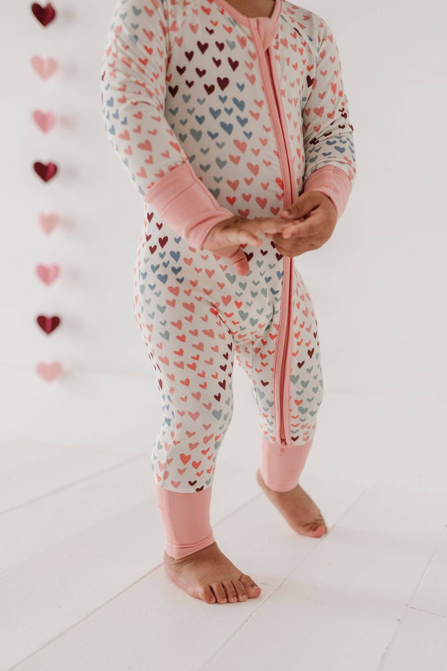 Rainbow Hearts Long Sleeve Zip Romper