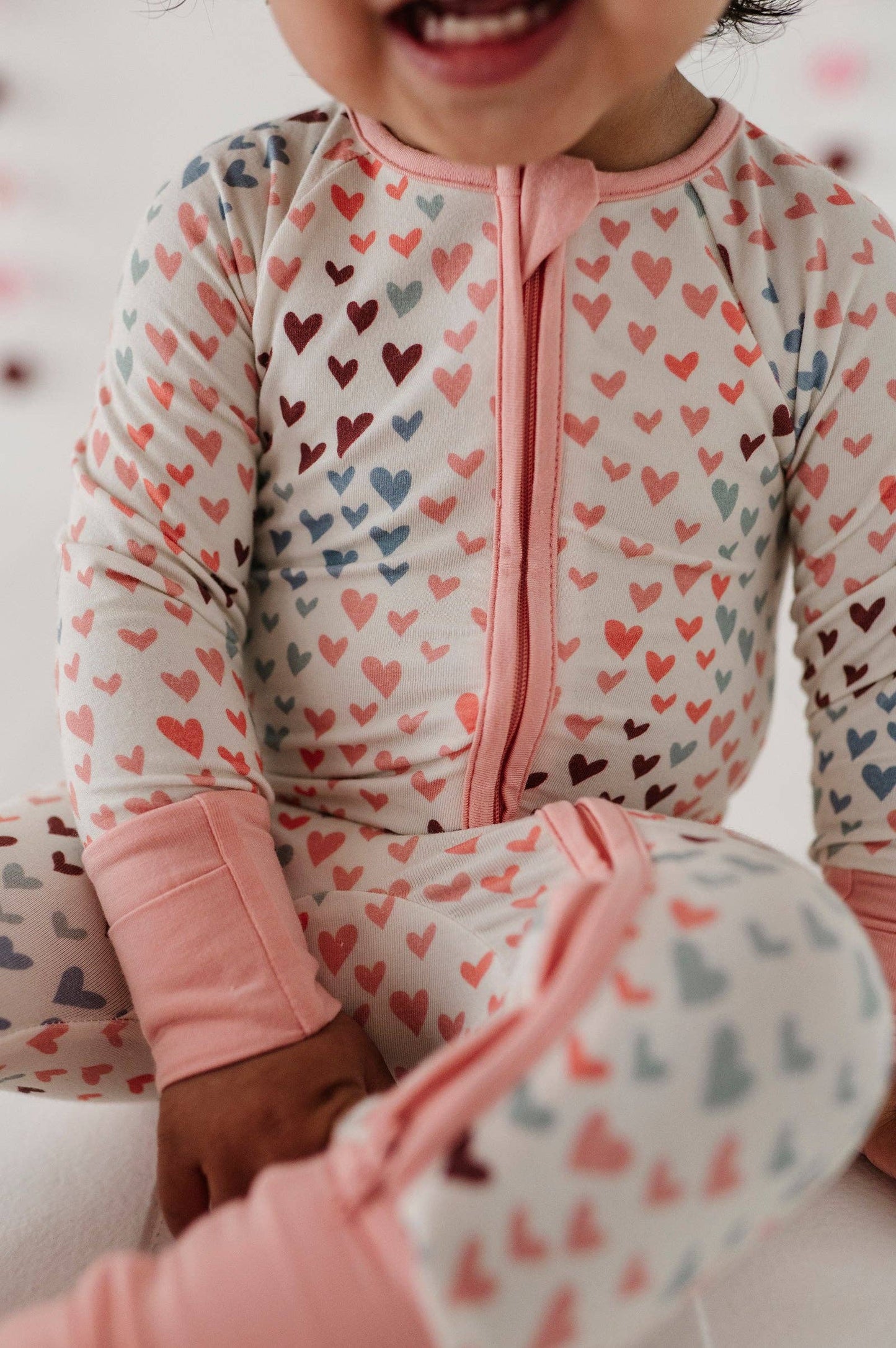 Rainbow Hearts Long Sleeve Zip Romper