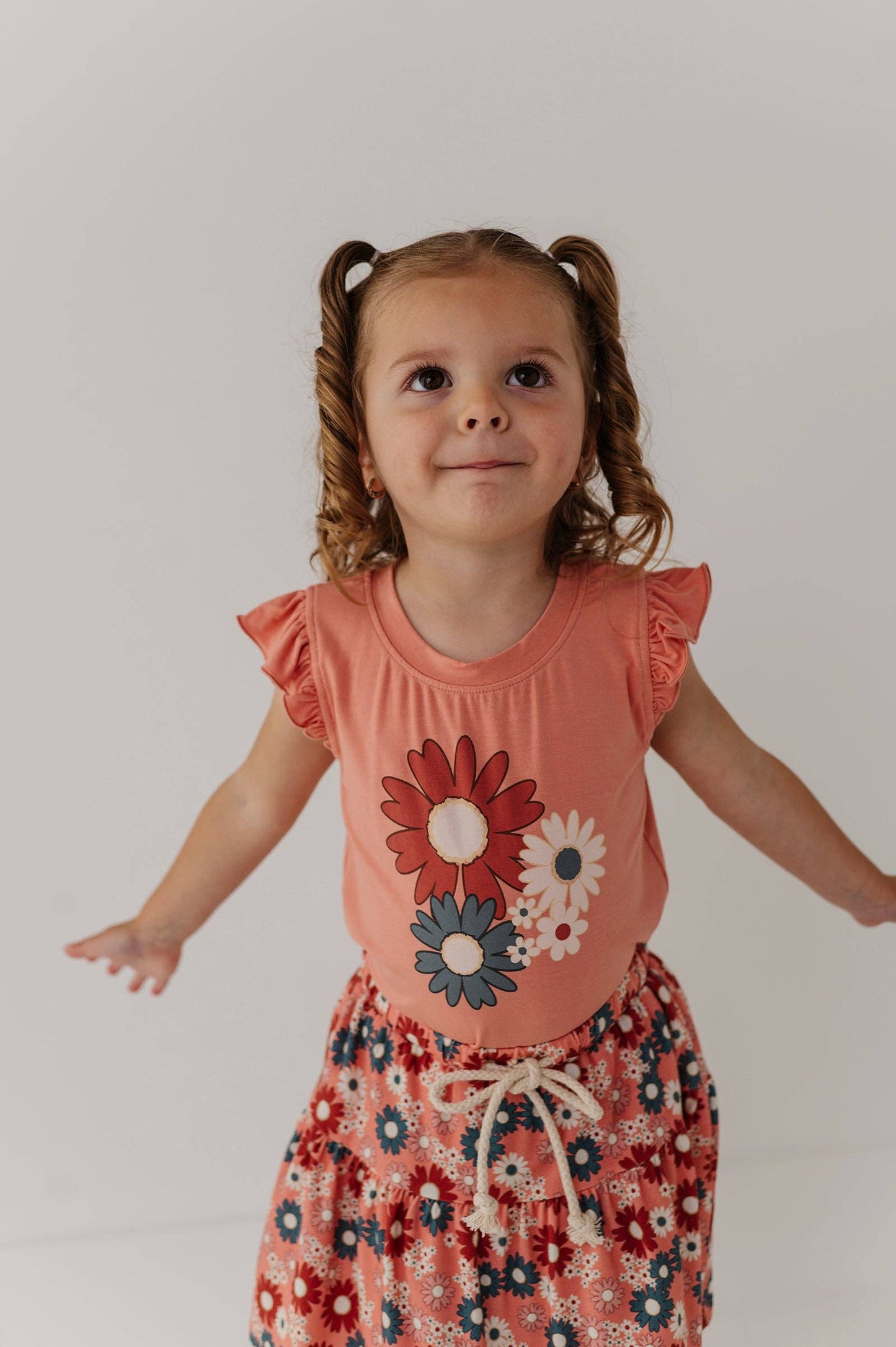 Zoey Daisy Ruffle Sleeveless Top