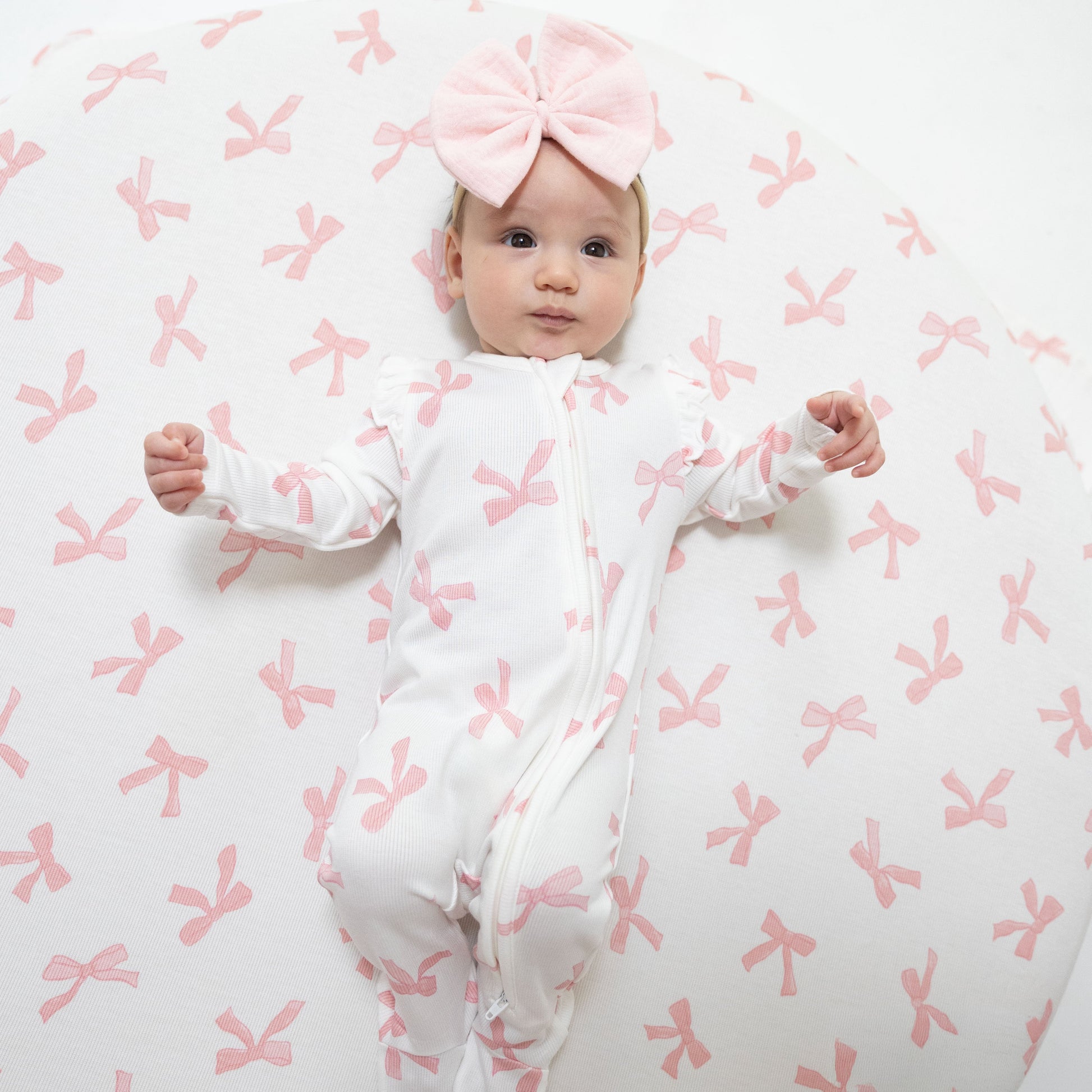 Pretty Bows 2 Way Ruffle Sleeve Zipper Footie