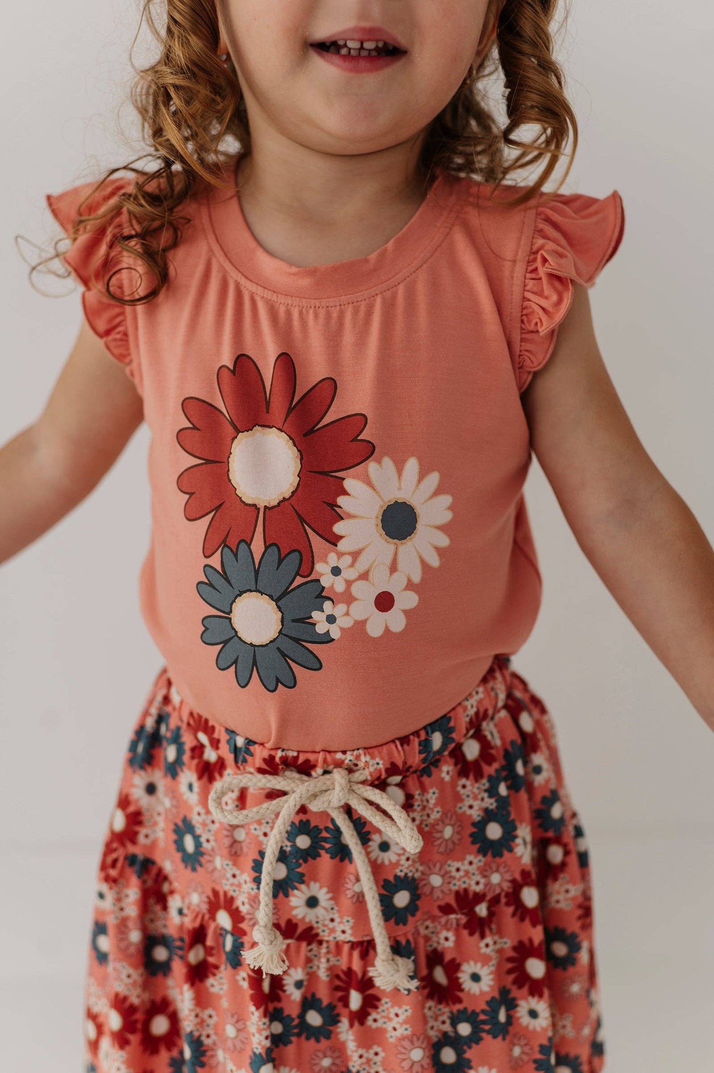 Zoey Daisy Ruffle Sleeveless Top