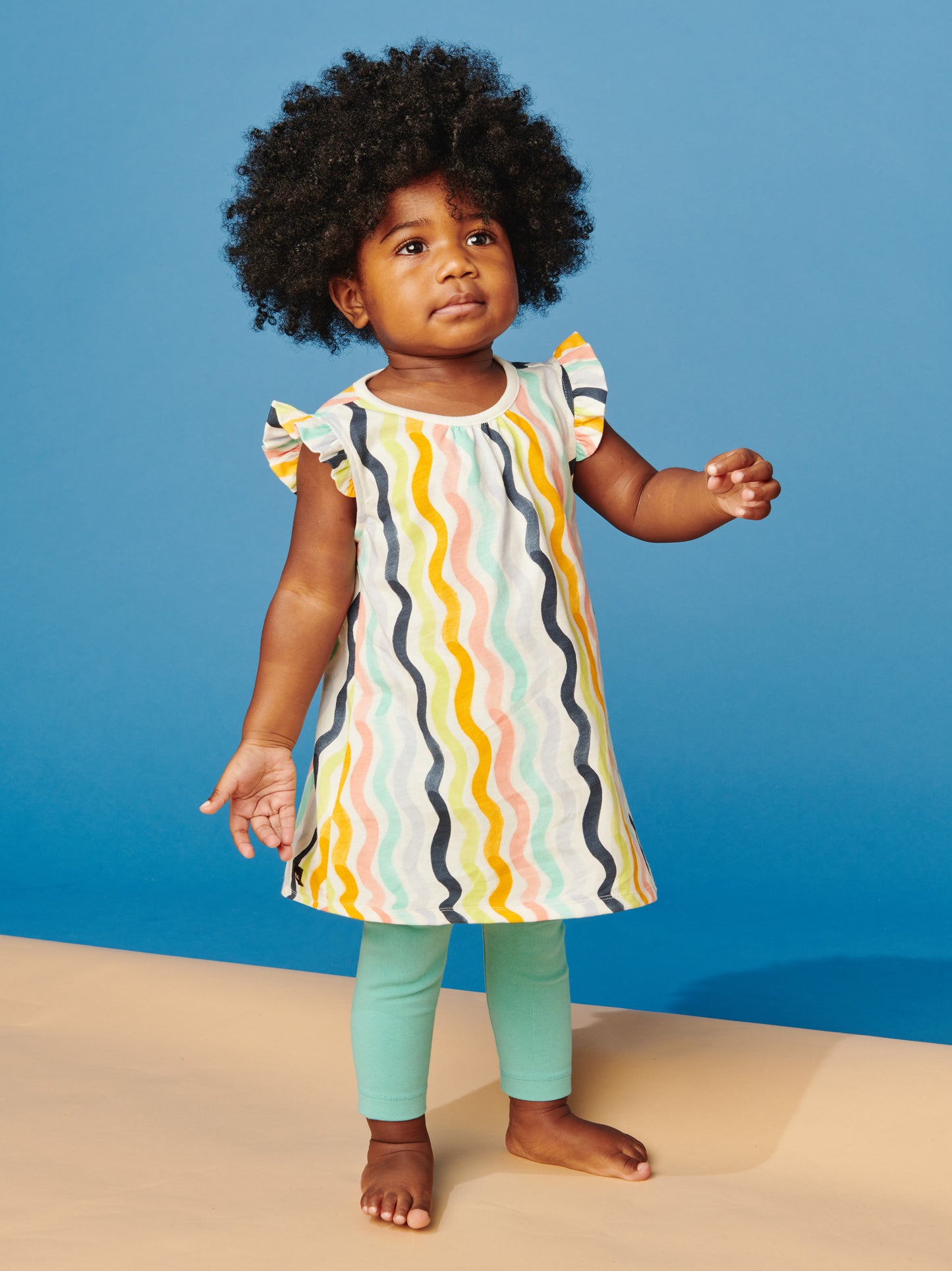 Ruffle Shoulder Baby Dress: Rainbow Wave